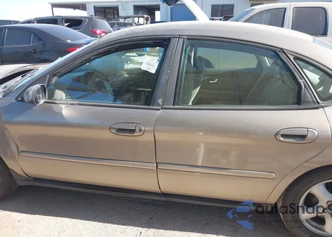 2003 Ford Taurus Ses z USA, uszkodzony, nr VIN 1FAFP55243G138459